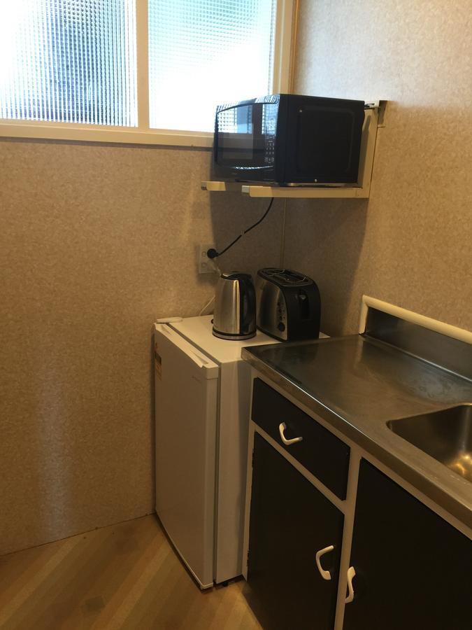 נלסון Mid City Motor Lodge מראה חיצוני תמונה